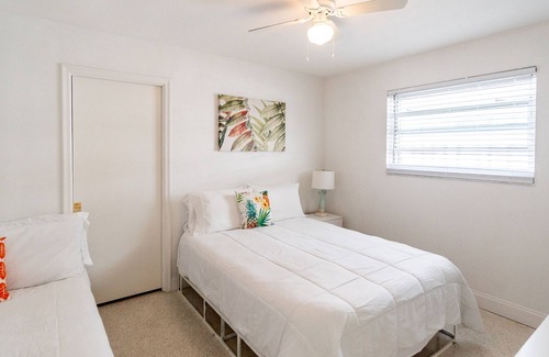 Melaleuca Gardens House | Cozy tropical home! Panoramic view of the canal. Fishing getaway near the ocean!