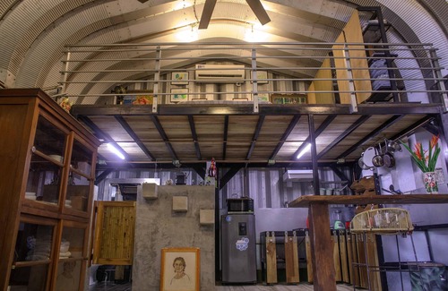 Jaco House | Cozy tropical/industrial quonset located in a secondary tropical forest.