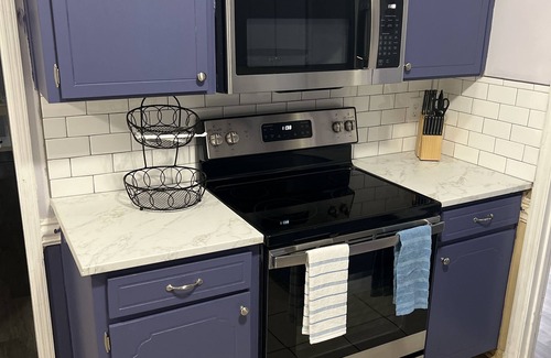 Columbus House | Cozy updated home with luxury bathrooms and kitchen located 5 minutes from post
