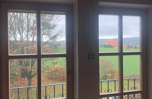 Mahring House | Cozy vacation home with large garden and fireplace, dogs allowed.