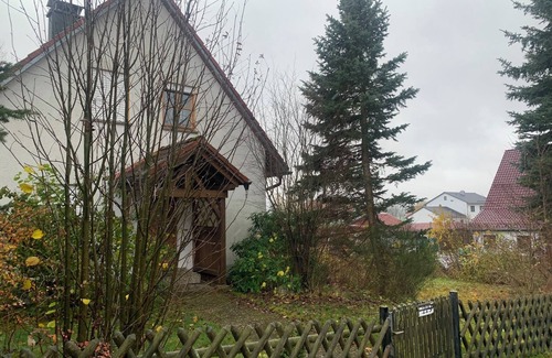 Mahring House | Cozy vacation home with large garden and fireplace, dogs allowed.
