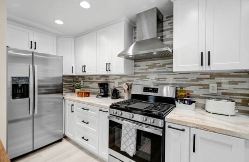 Alhambra House | Cozy Vega Haven EV charger: Private Rear-House Retreat with King Bed