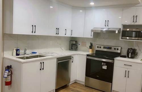 Calgary House | Cozy walkout basement close to YYC airport 2 bed 1 bath East facing