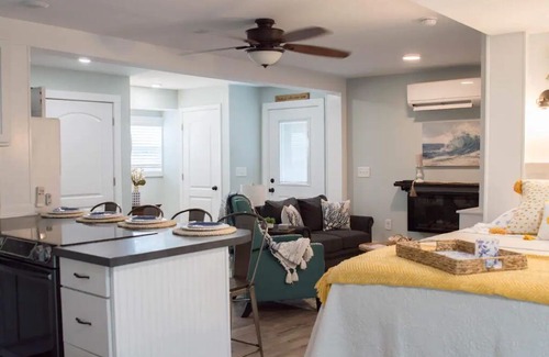 Harkers Island Resort | Cozy waterfront retreat with lighthouse view.