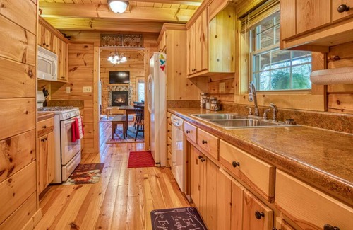 Clearwater Creek Cabin | Cozy, Wood Cabin. Private and with Firepit. Gated community.