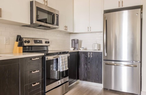 Downtown Louisville Apartment | CozySuites at Nulu