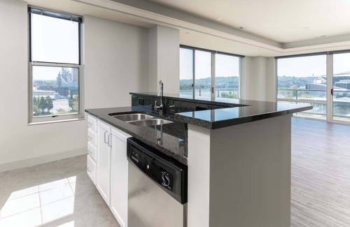 Central Business District Apartment | CozySuites at the Banks gym, pool 12