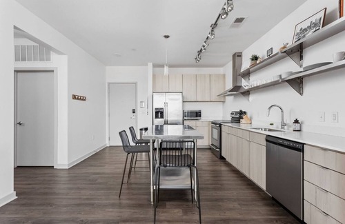 Downtown Indianapolis Apartment | Cozysuites l Trendy 2BR Bottleworks Indy 1