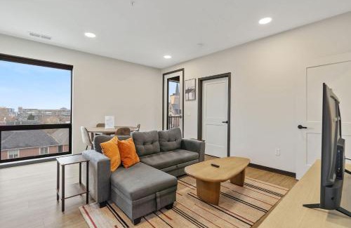 Lockerbie Square Apartment | CozySuites Mass w parking lounge & roof deck #26