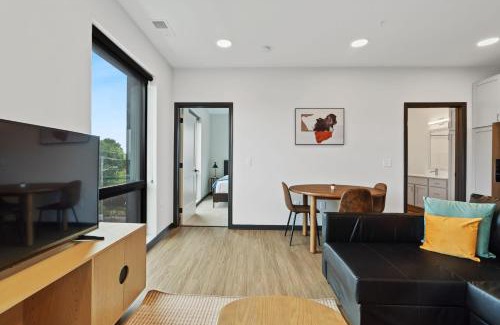 Lockerbie Square Apartment | CozySuites on Mass with garage parking #21