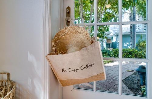 Holmes Beach House | Cozzi Cottage located only steps to the white sandy beaches complete with rooftop terrace