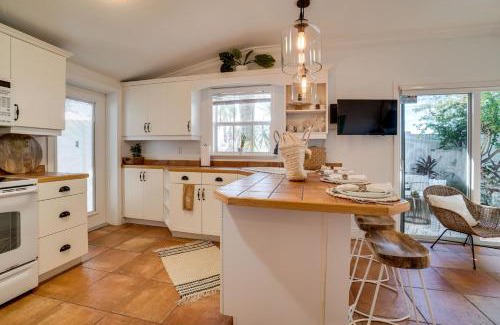 Holmes Beach House | Cozzi Cottage located only steps to the white sandy beaches complete with rooftop terrace