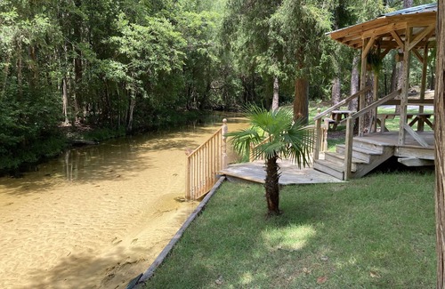 Holt RV Rental | Creek Waterfront Private RV Lot (3 minutes from interstate)
