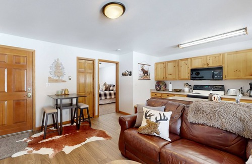Grand Lake Condo | Creekside condo w/patio, fireplace & open layout perfect for a group getaway