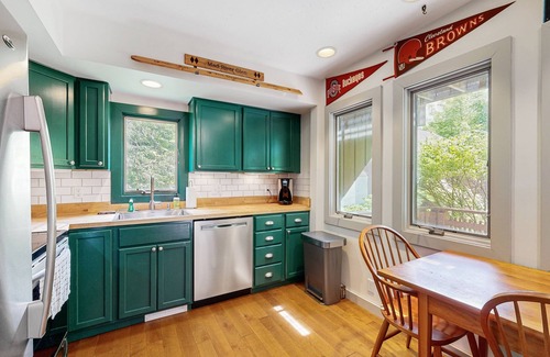Waitsfield Condo | Creekside condo with pool, next to Catamount Trail on river with water views
