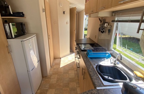 Cresswell House | Cresswell Towers Caravan Pet friendly - 500 yards to beach.