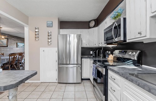 Twin Lake House | Crocker Lake Escape: A spacious 3-bedroom retreat with lake access and a hot tub.