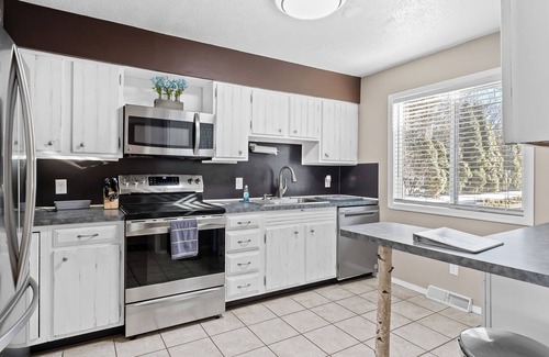 Twin Lake House | Crocker Lake Escape: A spacious 3-bedroom retreat with lake access and a hot tub.