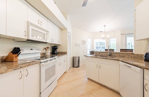 Crown Pointe House | Crown Pointe lake view heated pool home (w/2 King bedrooms) minutes to downtown & beaches!