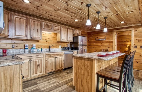 Black Bear Falls Cabin | Cub Path Lodge - Luxurious 5/5 With Theatre Room And Mountain Views! 5 Bedroom Cabin by RedAwning