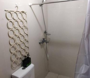 Socorro Apartment | Cubao Manhattan Heights Residential Condo TB30N - High Floor Studio with Balcony City View, Pool, Netflix, 5-Min Walk to the Araneta Coliseum Gateway Mall SM - Staycations by SMS