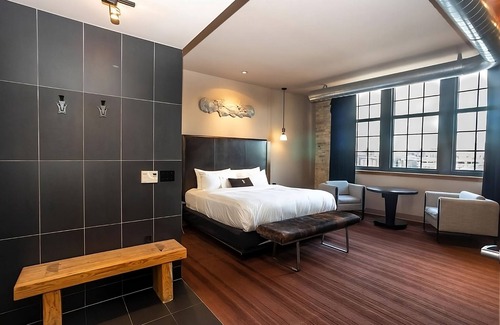 Fifth Ward Hotel | Custom Deluxe King at The Iron Horse Hotel, Short Drive To Erie Street Plaza!