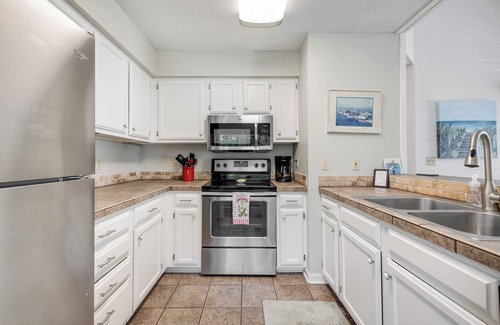 Pelican Bay House | Cute Family Beach Home in Wild Dunes Resort; Close to the Beach w/Porch Swing & Community Pool!