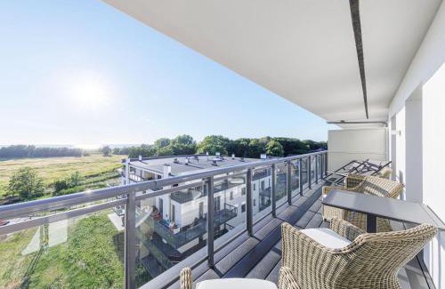 Ostseebad Wustrow Apartment | Dünenlounge - 5 Sterne Ferienwohnung mit West-Balkon und fantastischem Blick über den Deich