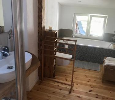 Wismar Apartment | Dachgeschosszimmer mit Terrasse