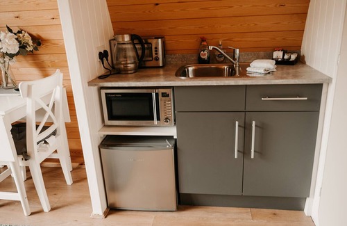 Torver Ski Chalet | Daffodil Mega Pod Glamping with wood fired Hot Tub