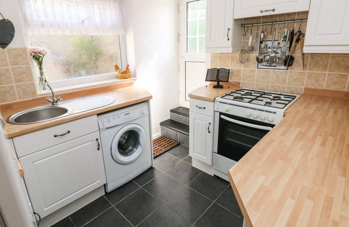 Pembrey Cottage | DAISYS COTTAGE, pet friendly, with a garden in Pembrey