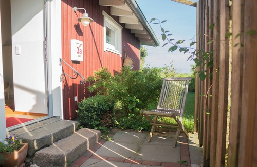 Grodersby House | Das Pustehus in Grödersby, Weitblick Über Wiese und Feld zur Schlei