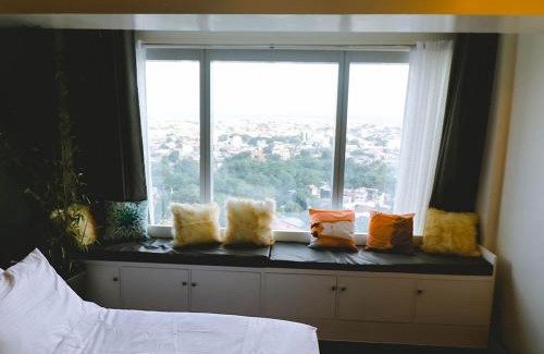 Poblacion District Apartment | Davao Rental - AEON Towers Condo 1BR Suite 1Bathroom with Bathtub, Kitchen, Living Room