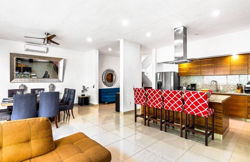 Fluvial Vallarta House | Dazzling estate with a pool, rooftop balcony, four-bedrooms, washer/dryer, & AC