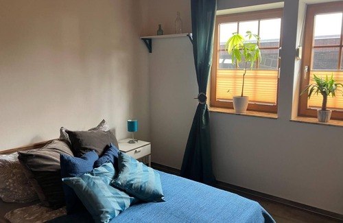 Insel Poel Apartment | Deine Auszeit an den Salzwiesen im Fachwerkhaus mit Gemeinsamer Küche & Eingang