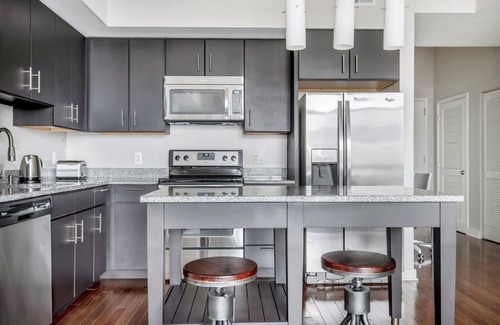 Woodmont Triangle Apartment | Delightful Bethesda Bainbridge 2BR w/Rooftop Pool & W/D, nr Dining, by Blueground