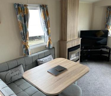 Par House | Delightful two bedroom caravan on Par Beach.