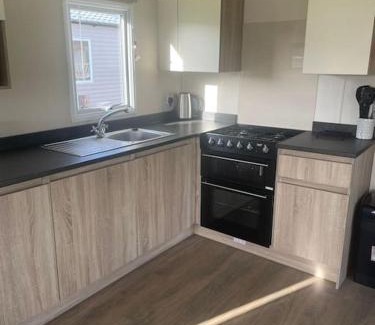 Par House | Delightful two bedroom caravan on Par Beach.