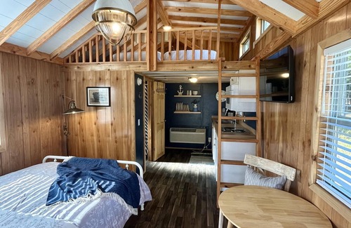 Bolivia RV Rental | Deluxe Loft Cabin - Upscale Cozy Loft Cabin