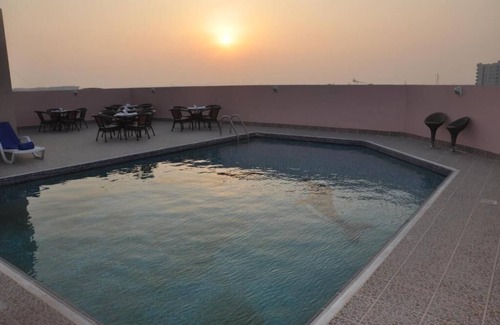 Al Qusais Apartment | Deluxe Room Near Tudomart By Luxury Bookings AC