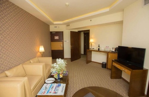 Al Qusais Apartment | Deluxe Room Near Tudomart By Luxury Bookings AC