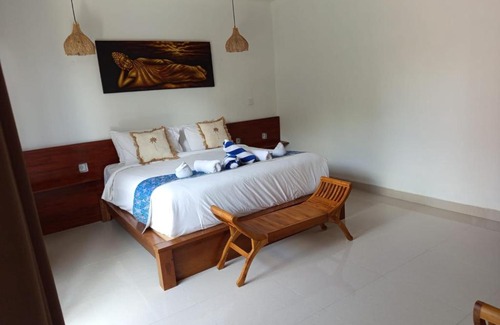 Mambal House | Deluxe Room Puri Uma Dewi room only