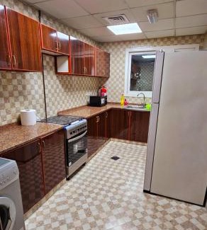 Al Khan House | Deluxe Room with Attached Private Bathroom in Shared Apartment