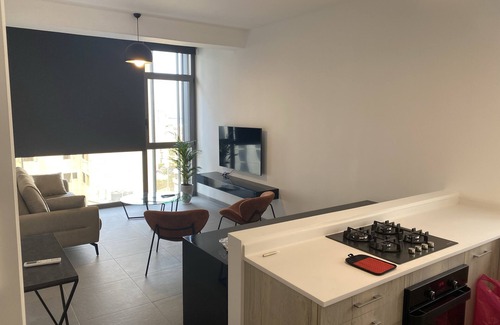Sodeco Apartment | Deluxe Stay in Vibrant Monot 22/24 Electricity