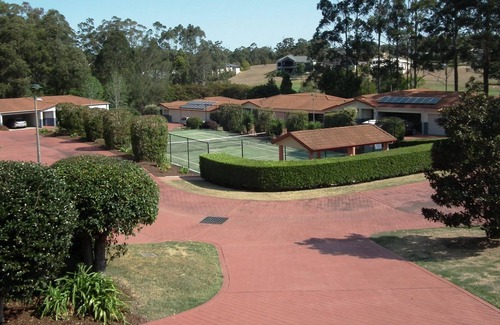 Tallwoods Village House | Deluxe Townhouse on Tallwoods Golf Course, Swimming pool and tennis court