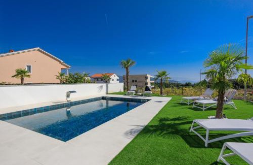 Krk Villa | Deluxe villa with heated pool, whirpool, sea view near beautiful beach III - by Traveler tourist agency Krk ID 2402