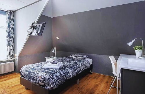 Geertruidenberg House | DenBerg building, formerly a small budget hotel, now offers 7 bedrooms with heating and air conditioning.