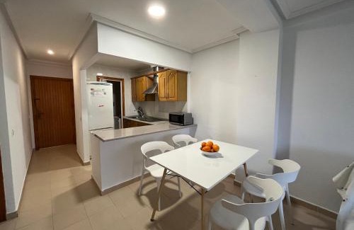Arenales del Sol Apartment | Descanso y jardines con piscinas