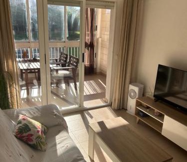 Arenales del Sol Apartment | Descanso y jardines con piscinas