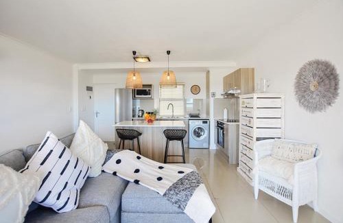 Big Bay Apartment | Designer Beachfront Apartment in Big Bay with swimming pool- 2 bedroom, 1 Azure
